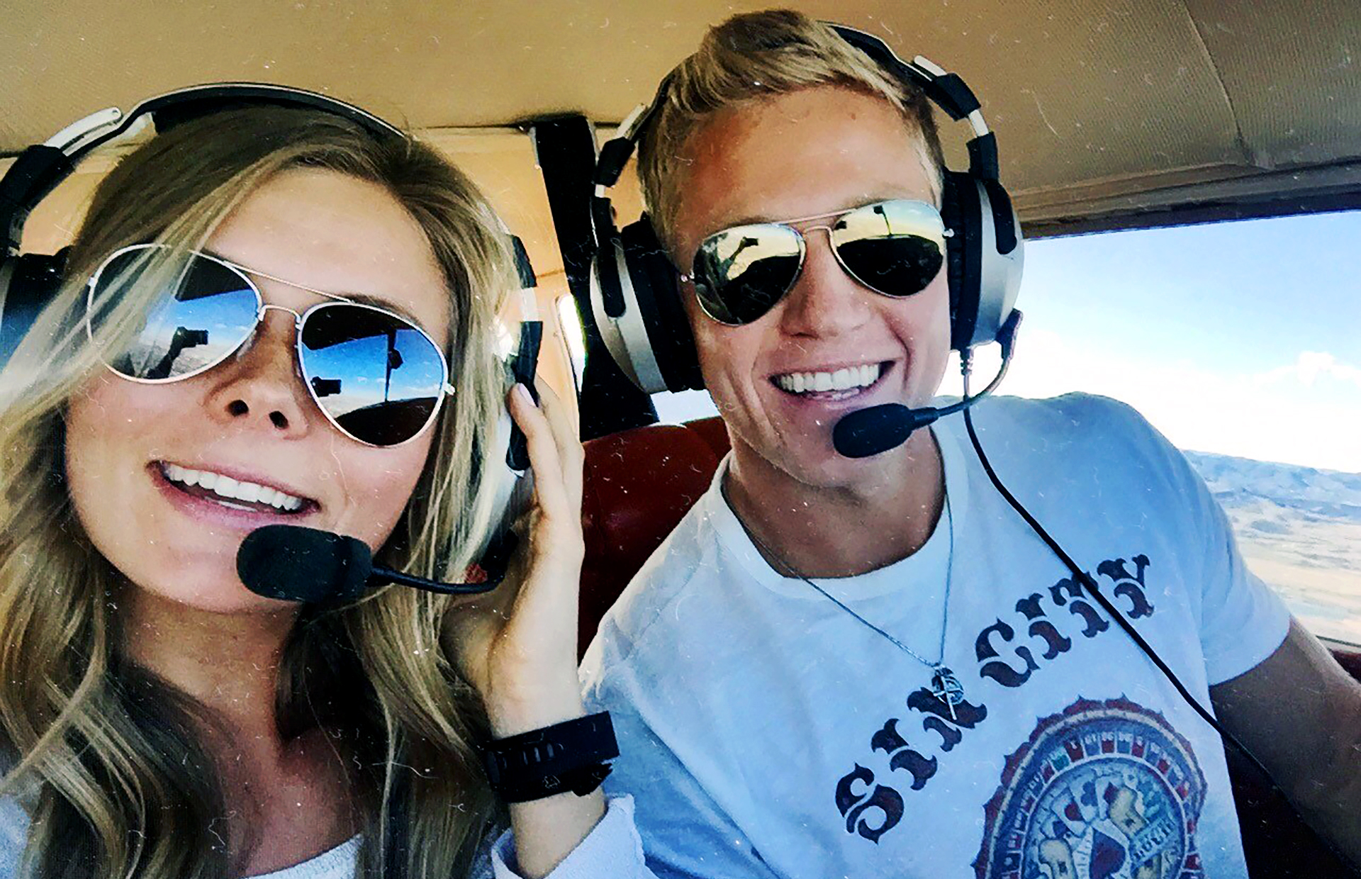 Ryan Wix (right) flying with his wife.
