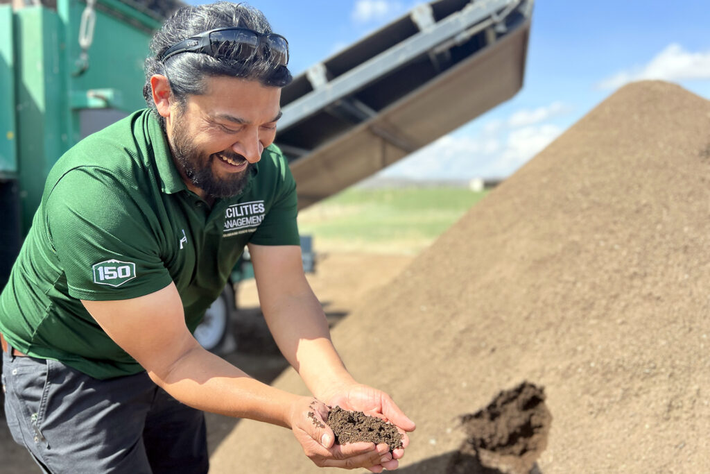 Gilbert Mojica, the compost pperator at CSU, demonstrates how a curing pile is nearly finished.