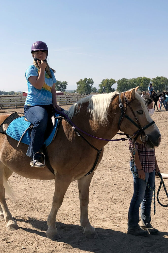 RAM Scholar Anika Pounds riding a horse.