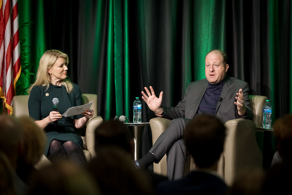 President Amy Parsons and Gov. Jared Polis
