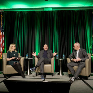 CSU President Amy Parsons, Colorado Governor Jared Polis and Utah Governor Spencer Cox onstage at the Disagree Better event