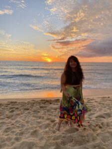 CSU Student Valeria Valles Castañeda at the beach at sunset.