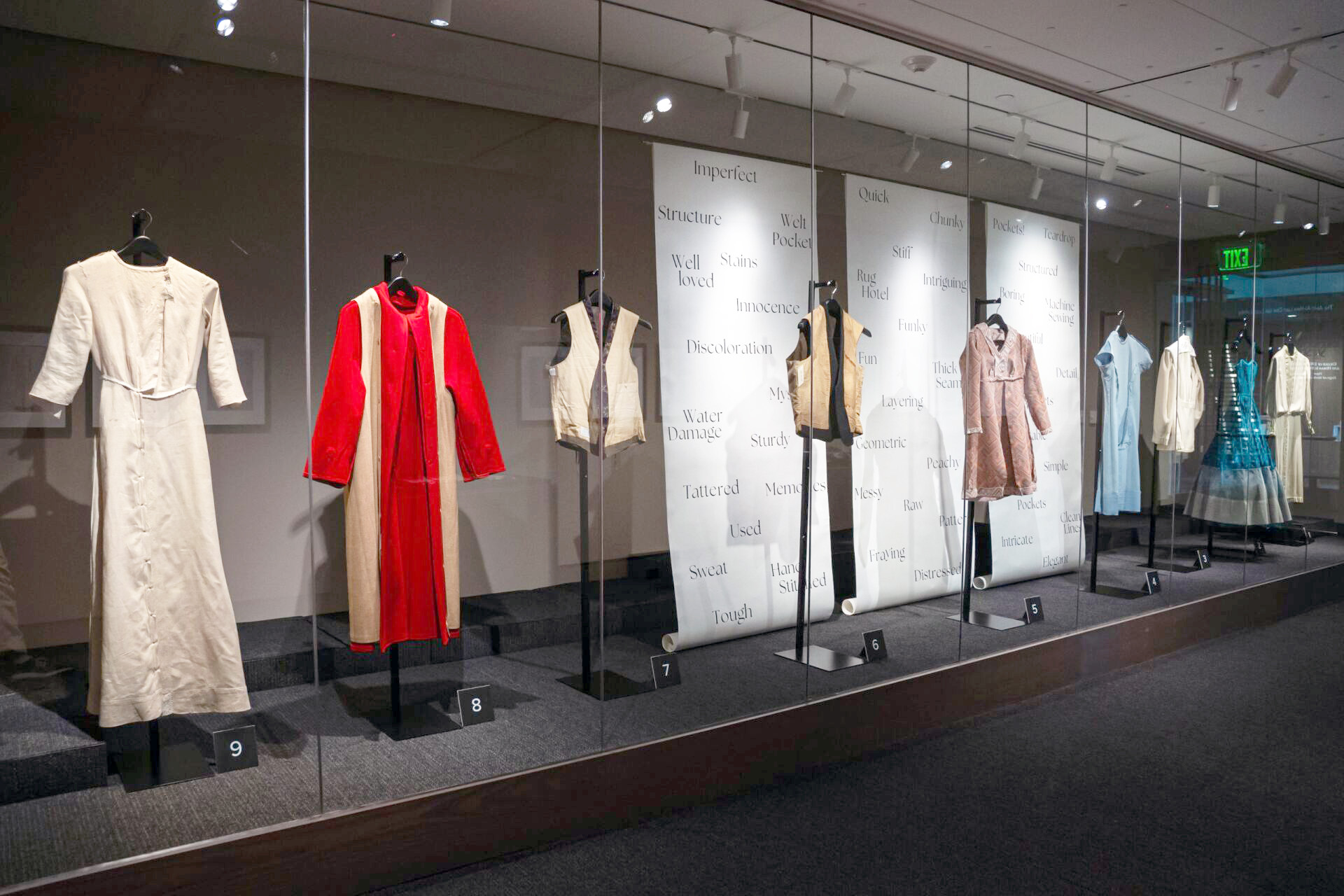 A hallway look of an Avenir Museum collection of garments shown inside out is part of the museum's Spring 2024 collection.