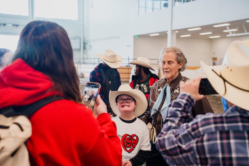 Fans surround Temple Grandin at the Exceptional Rodeo